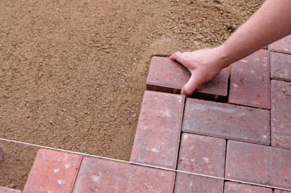 Placing the pavers onto the gravel base