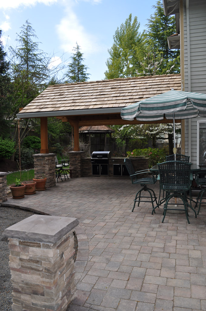Attached Rood with Paver and Cultured Stone Columns