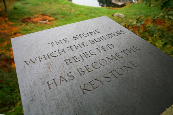 An engraved stone atop the Lincoln Kirstein Tower sculpture at architect Philip Johnson's iconic Glass House estate.