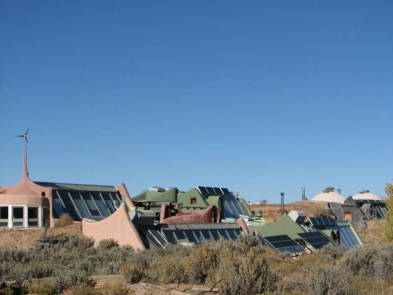 Earthship Home by Earthship Biotecture using compressed earth construction