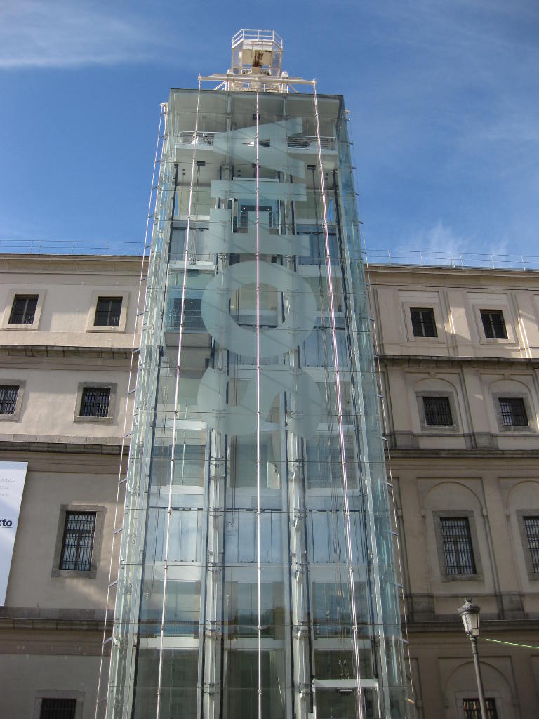 Exterior steel-framed glass elevators of the Reina Sofia Museum in Madrid, Spain