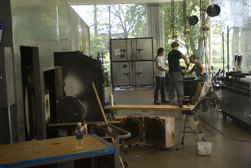 Glass artists working in the hot shop at the Toledo Museum of Art Glass Pavilion Gallery by SANAA