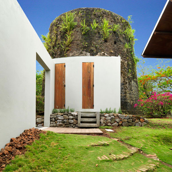 The entrance courtyard with washrooms appended to the windmill – ©LUMIS photography