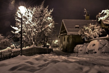 Snow-covered house | Image courtesy of robmcm