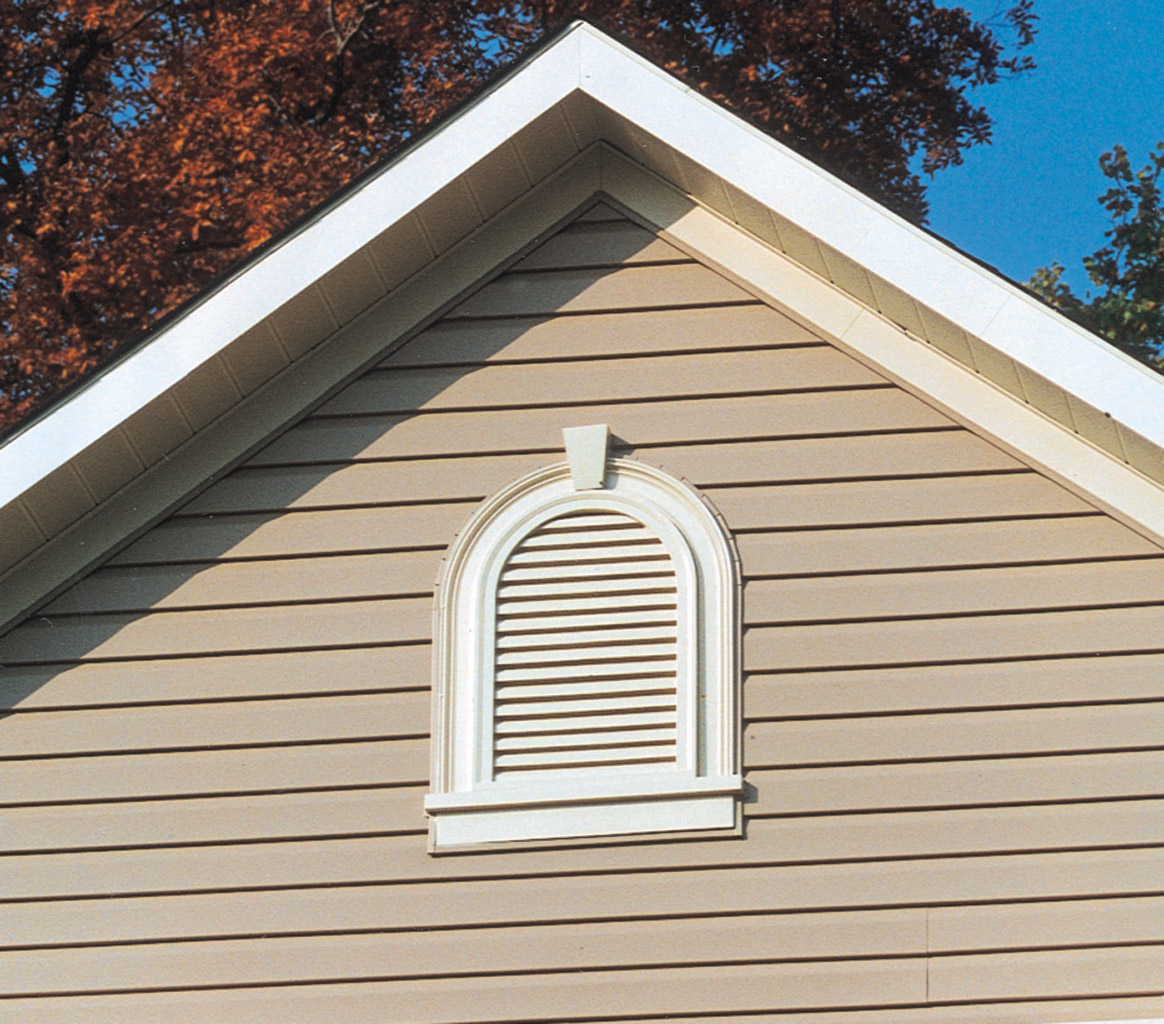 Cathedral-style louver with trim and keystone