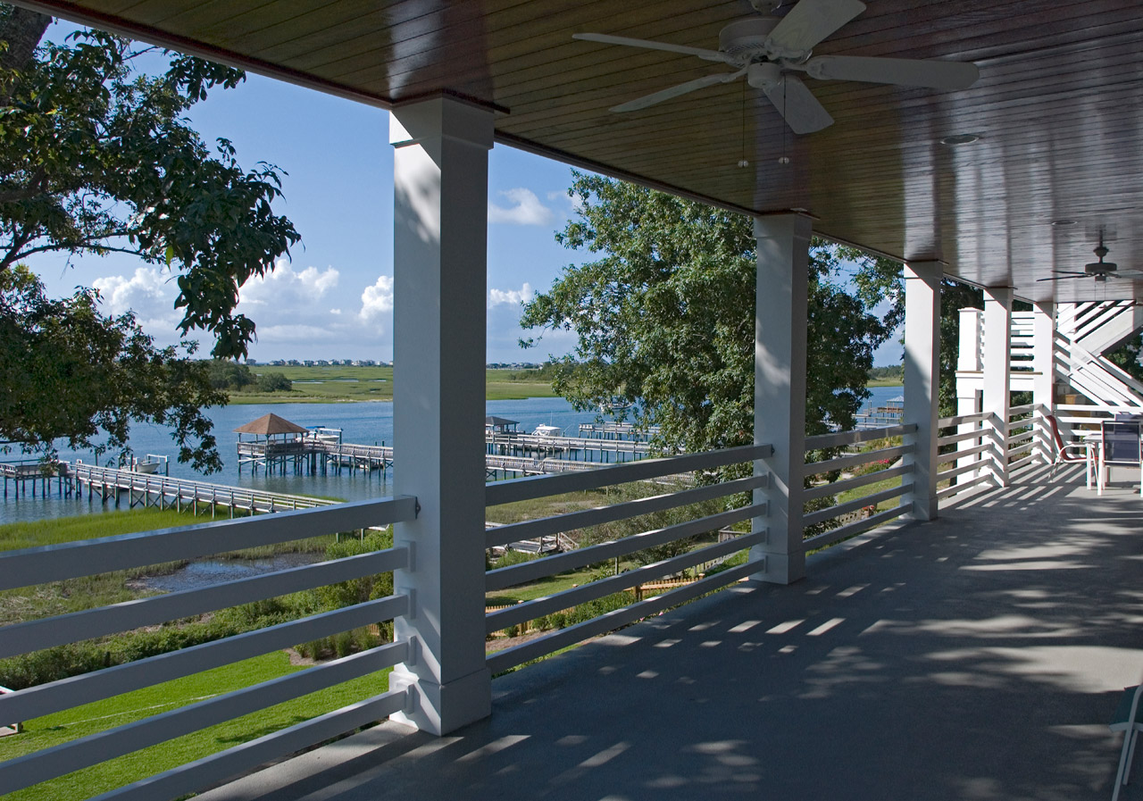 Elegant and easy to maintain Column Wraps enhance porch area.