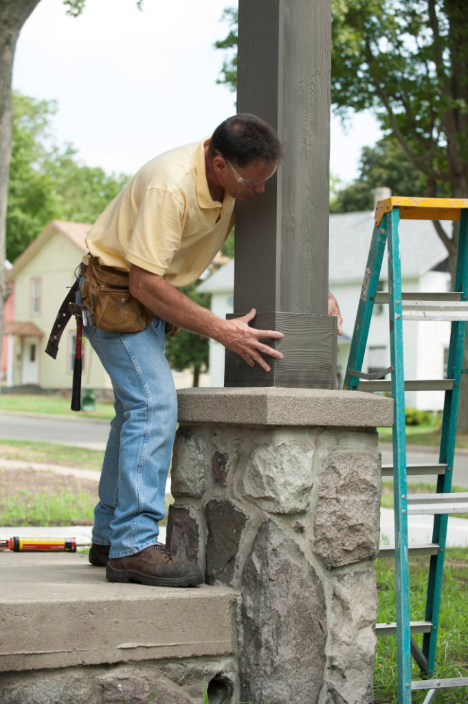 Roth adheres a column base to add architectural detail to the project.