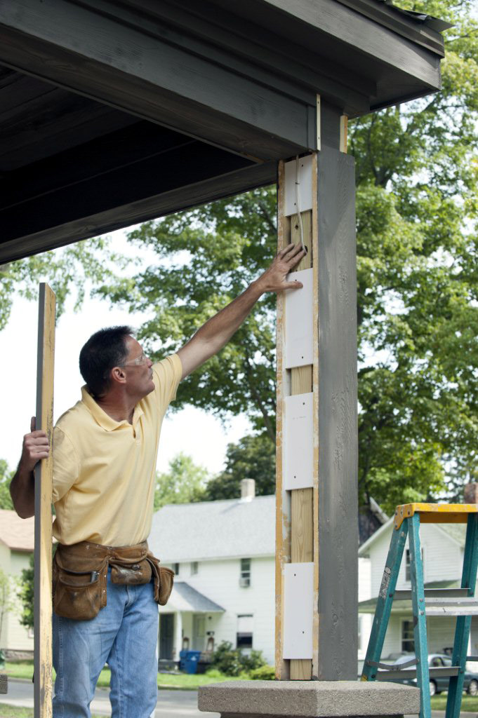 Contractor Steve Roth adds prepares inside blocking and adds column wrap.