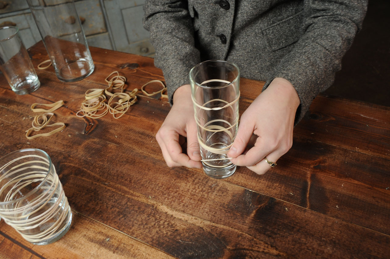 use rubber bands to create DIY Modern Frosted Candle Votives