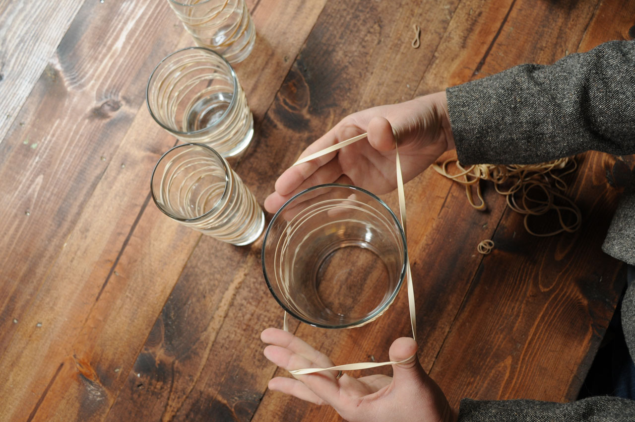 use rubber bands to create DIY Modern Frosted Candle Votives