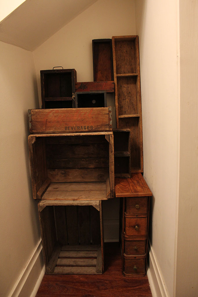 Arrange the crates for the DIY Vintage Crate Storage project