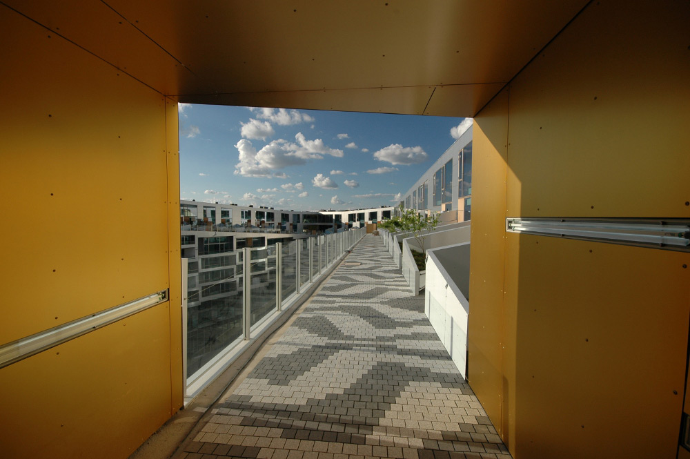 Exterior walkway of 8 House by Bjarke Ingels Group BIG