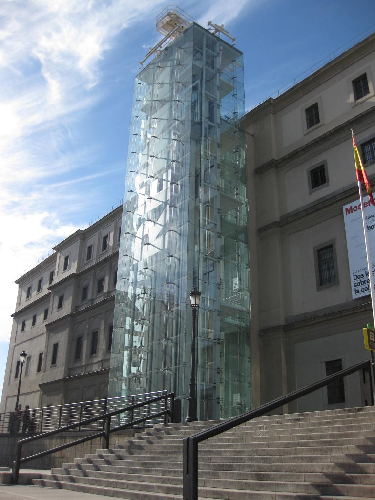Exterior steel-framed glass elevators of the Reina Sofia Museum in Madrid, Spain