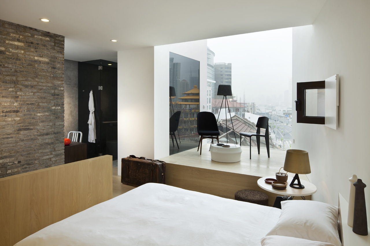 Hotel room inside the Waterhouse at South Bund located in  Shanghai, China designed by Neri & Hu Design and Research Office (NHDRO)