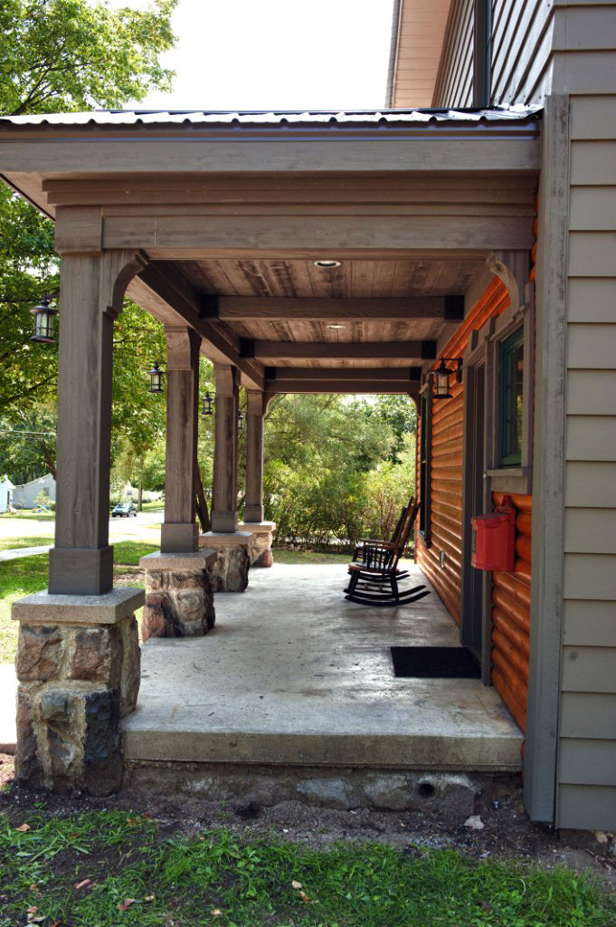 This porch ceiling was constructed using Fypon urethane shutters, faux beams and straps. 
