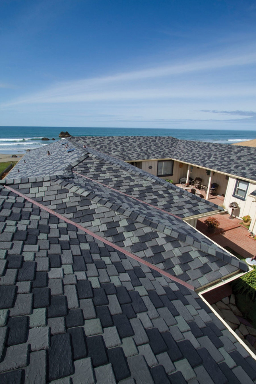 Custom blend of color on a California home roof featuring DaVinci Multi-Width Slate polymer roof.